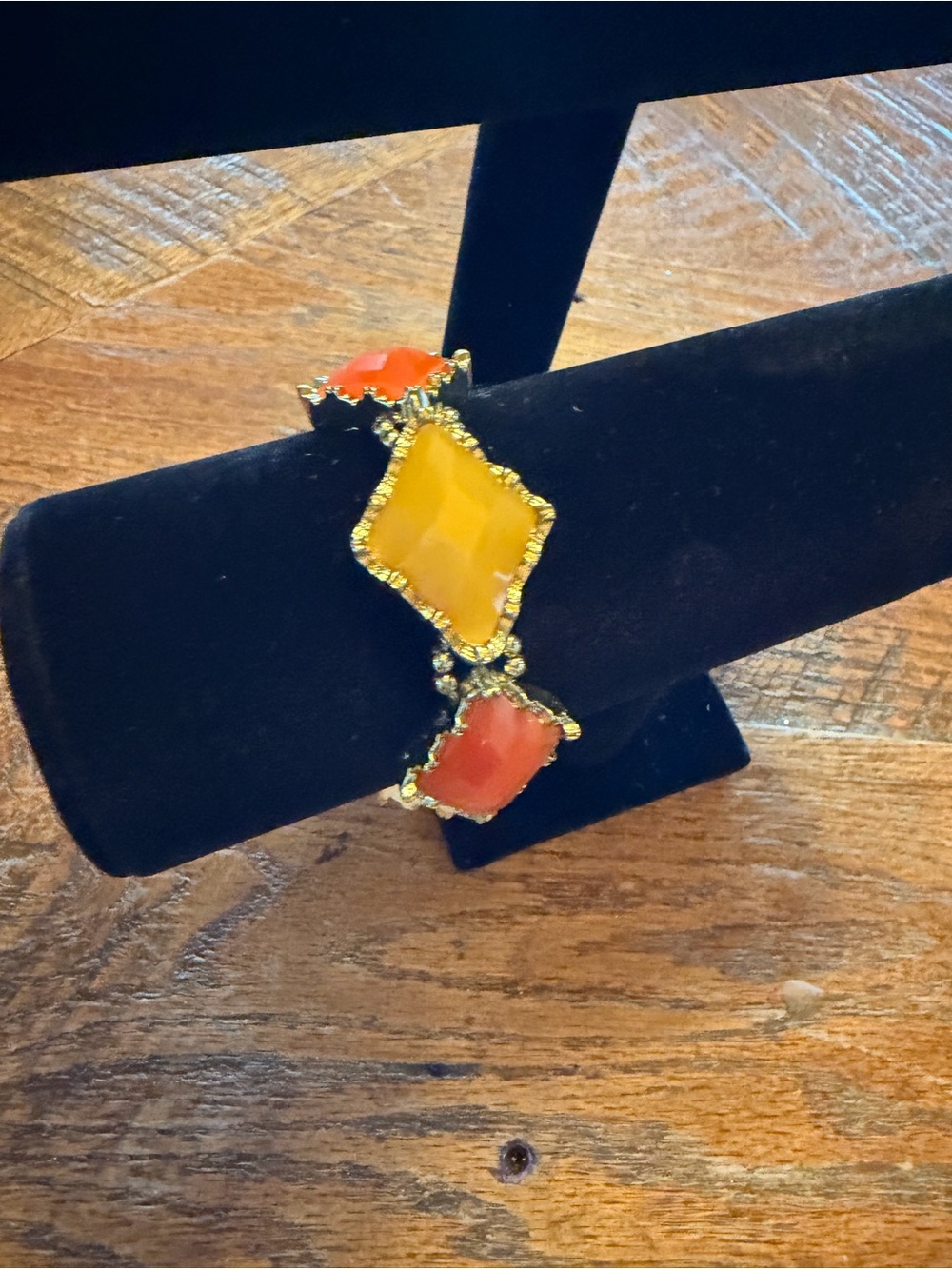 Gold-Tone Bracelet with Yellow and Coral Stones